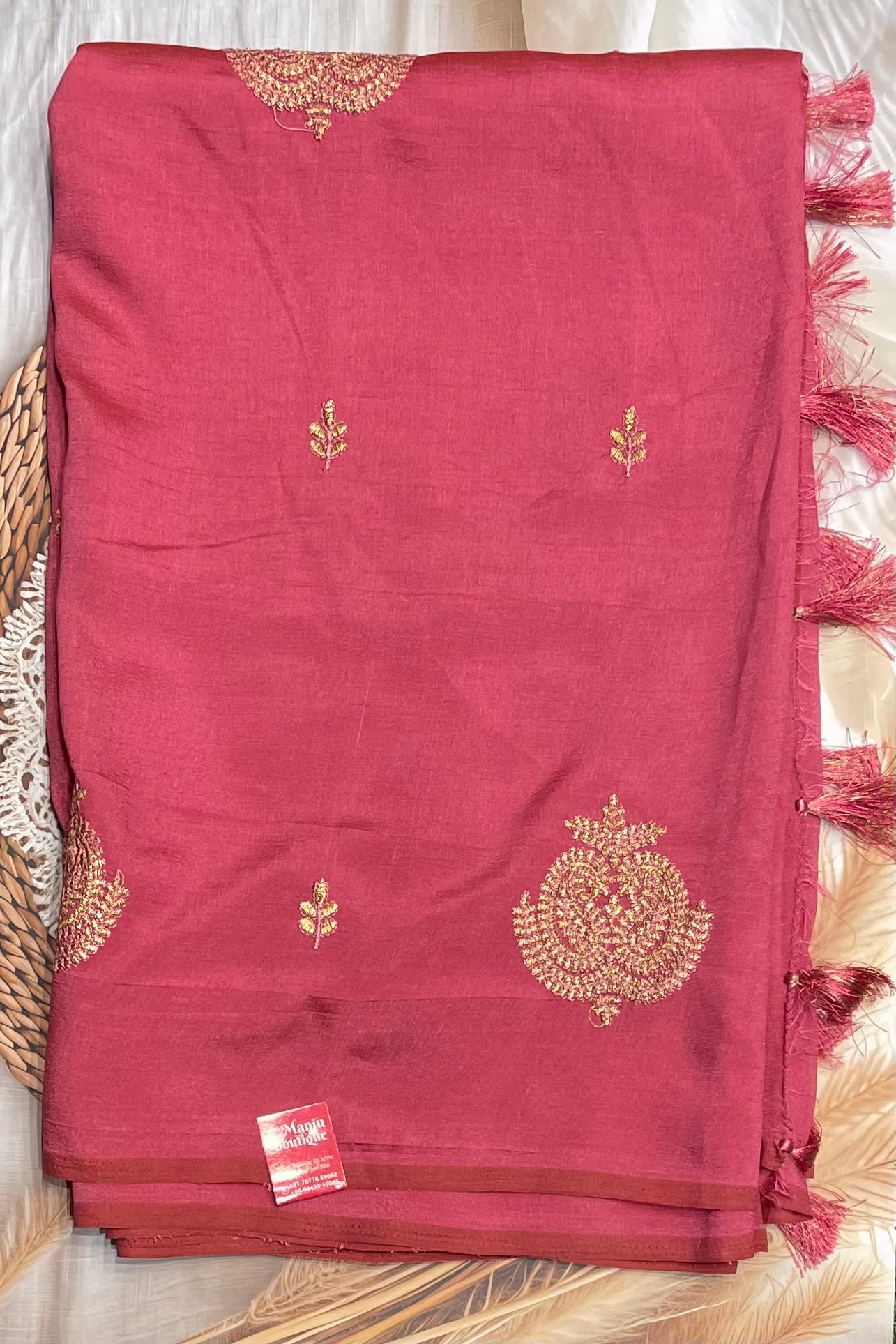 Onion Pink Malai Silk Saree displayed fully, showcasing its graceful embroidery and luxurious drape