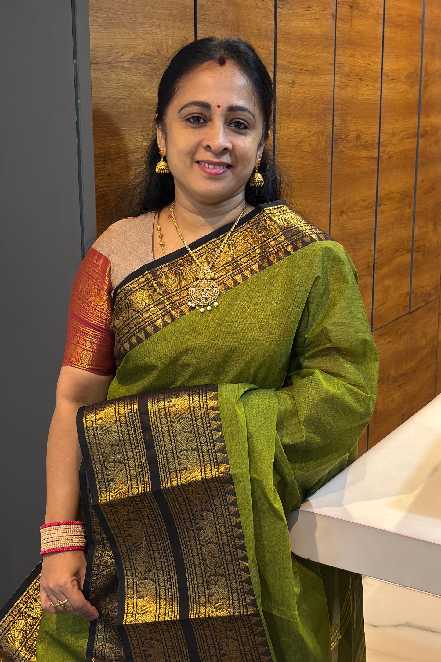 Meenakshi -Premium Kanchi Cotton Saree–Mehendi Green  With Black  | MCK86